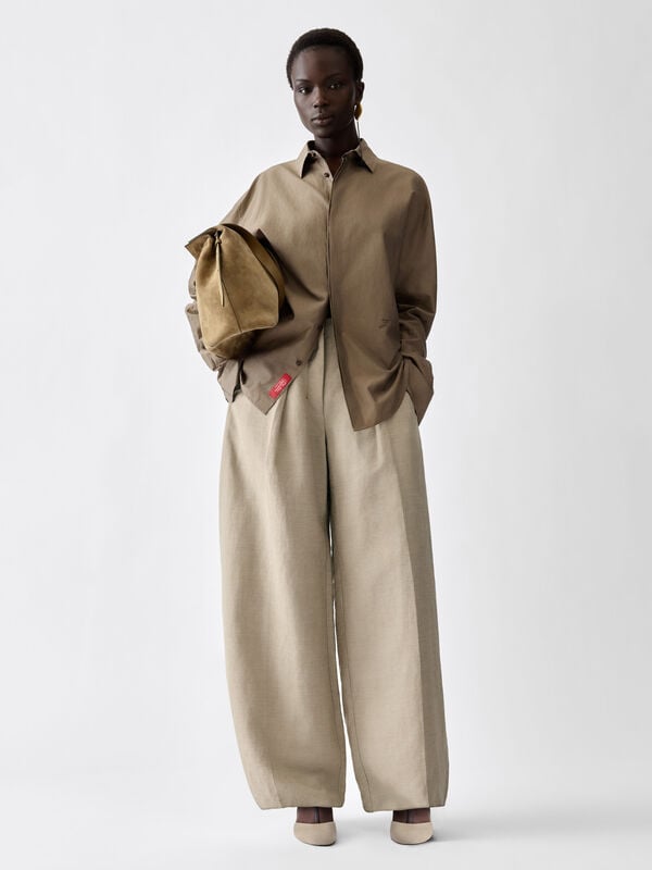 بنطال بقصة انسيابية The Ovalo jacquemus بنطال بقصة انسيابية the ovalo