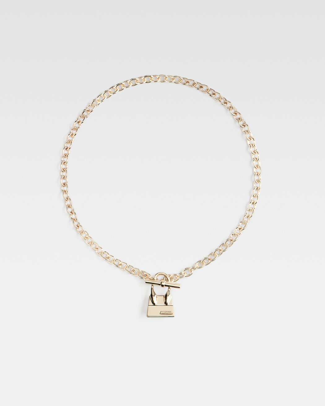 The Chiquito toggle charm necklace jacquemus the chiquito toggle charm necklace