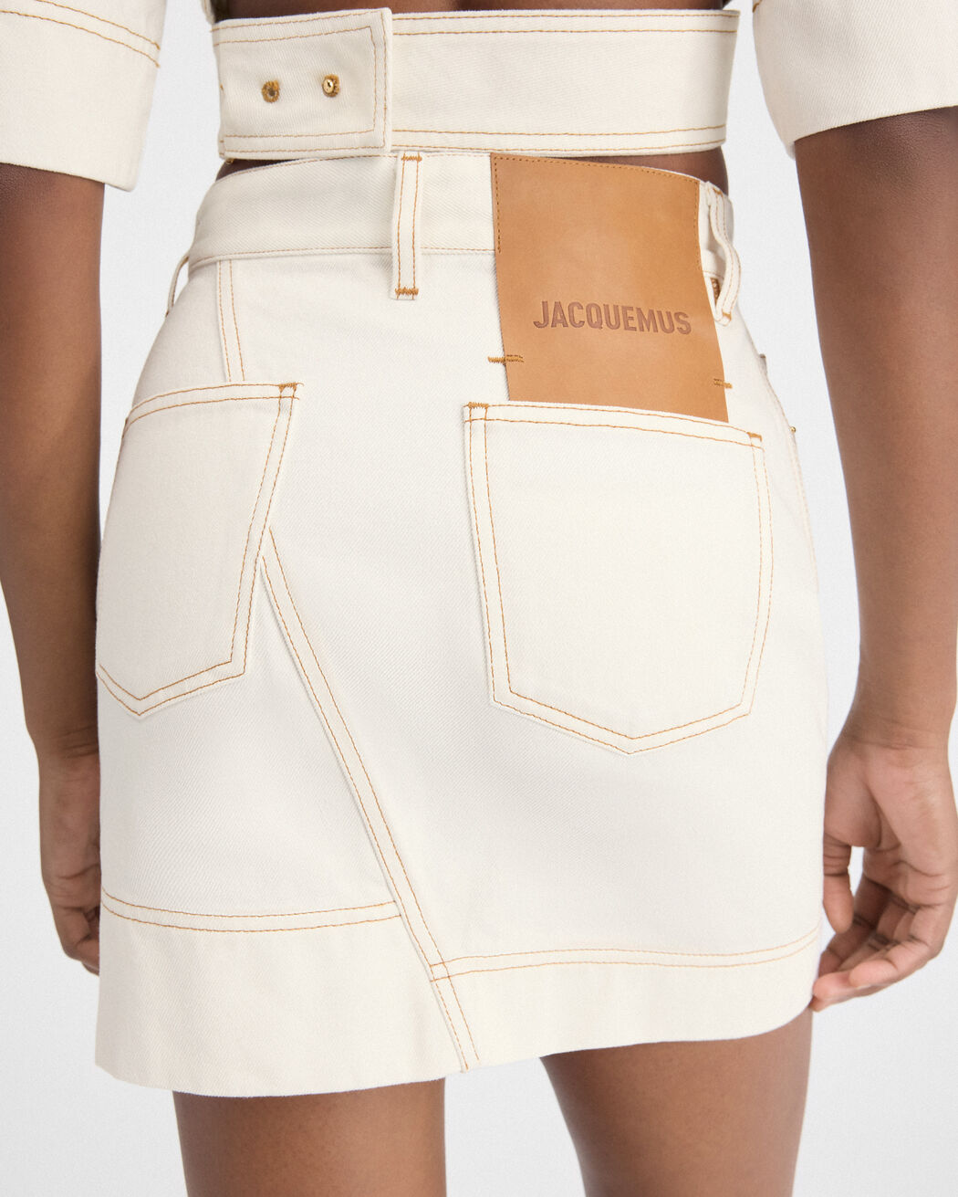 The de-Nîmes denim mini skirt jacquemus the de n mes denim mini skirt