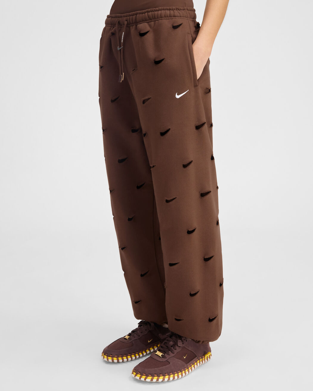 The Swoosh JACQUEMUS+NIKE track pants the swoosh jacquemus nike track pants