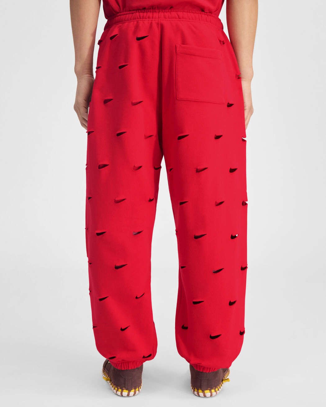 The Swoosh JACQUEMUS+NIKE track pants the swoosh jacquemus nike track pants