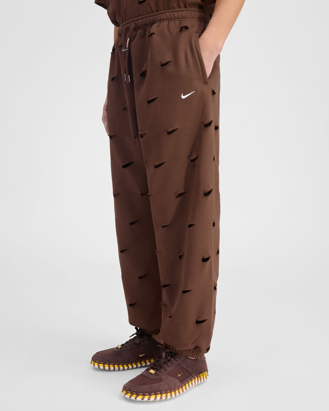 The Swoosh JACQUEMUS+NIKE track pants the swoosh jacquemus nike track pants