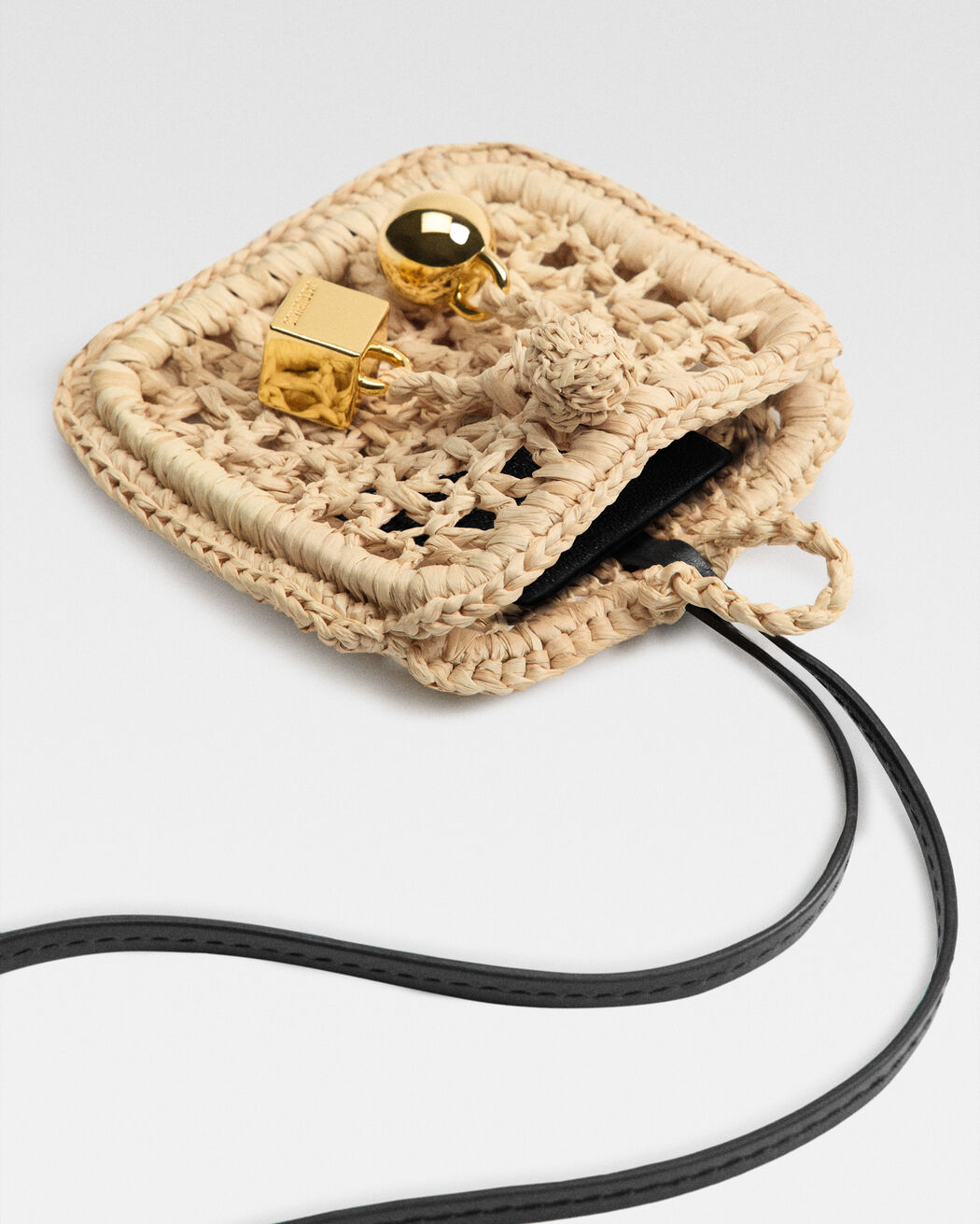 The Spiaggia حافظة سماعات jacquemus the spiaggia حافظة سماعات