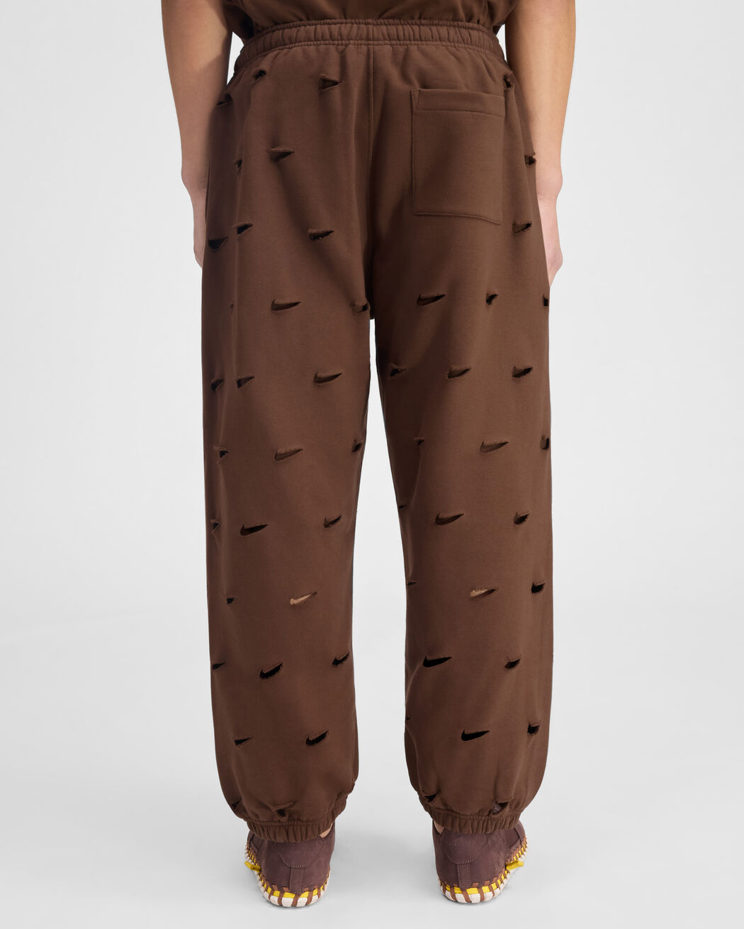 The Swoosh JACQUEMUS+NIKE track pants the swoosh jacquemus nike track pants