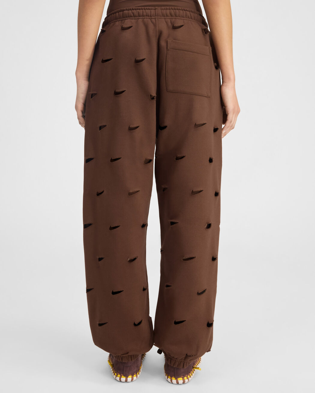 The Swoosh JACQUEMUS+NIKE track pants the swoosh jacquemus nike track pants