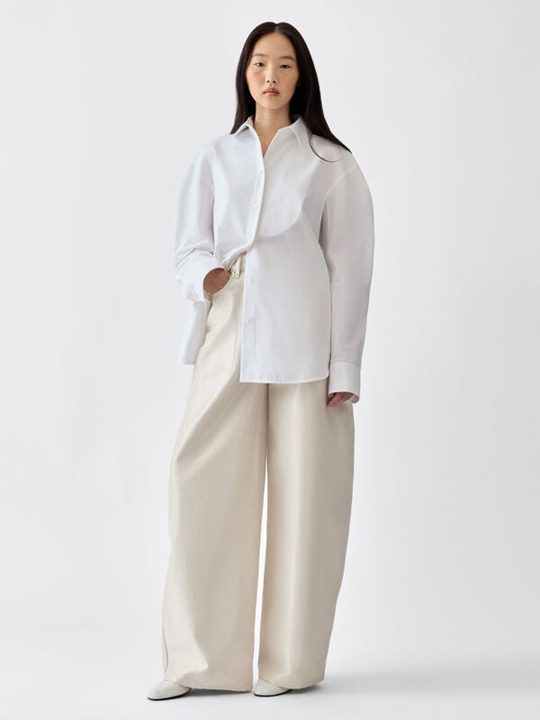 بنطال دنيم The de-Nîmes Ovalo jacquemus بنطال دنيم the de n mes ovalo