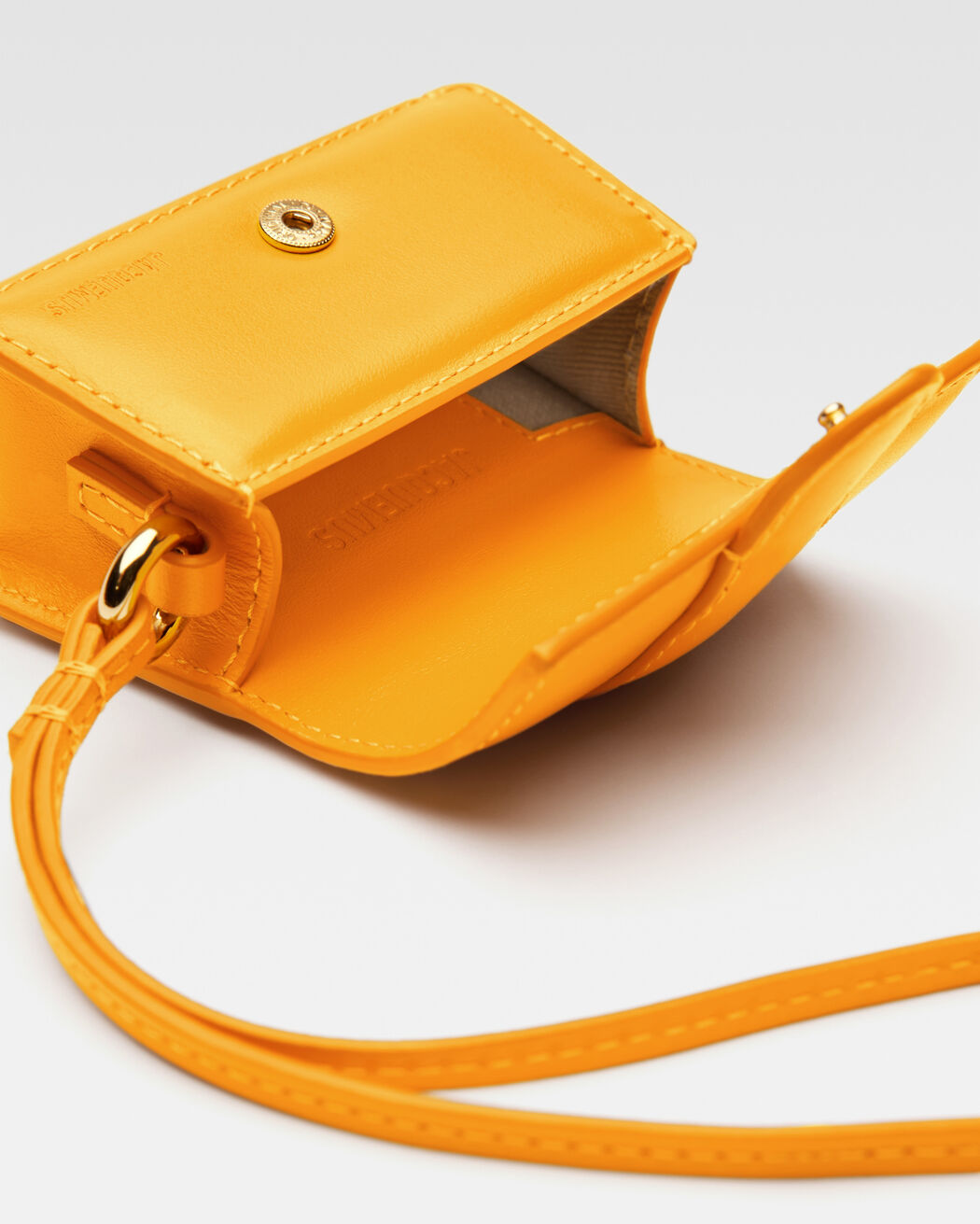 The Bambino flap case jacquemus the bambino flap case