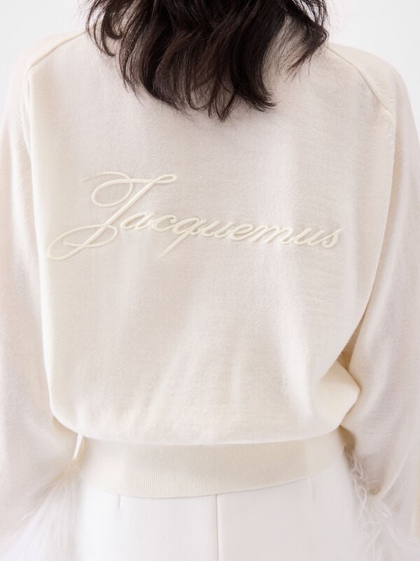 The embroidered sweater jacquemus the embroidered سترة