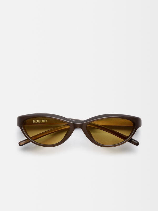 The Curvo sunglasses
 jacquemus the curvo sunglasses
