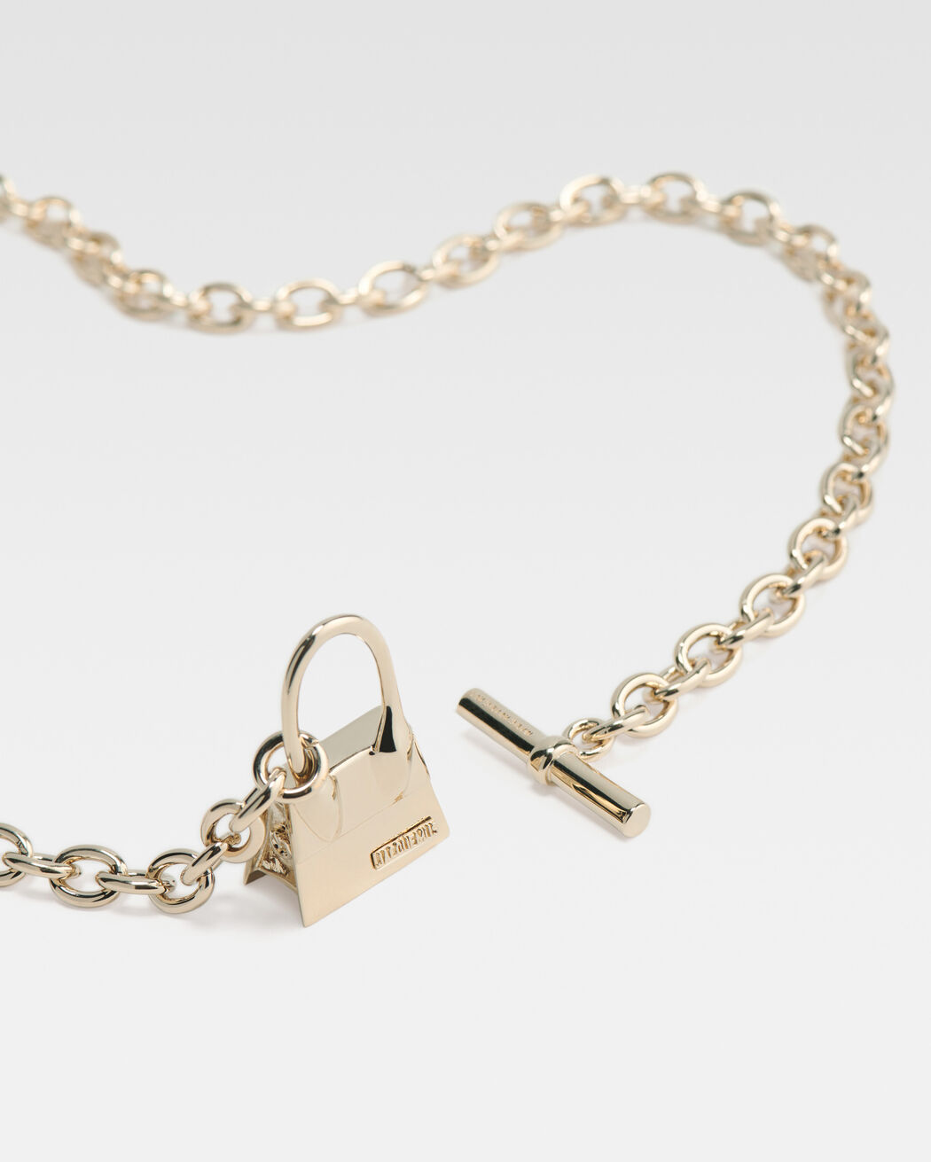 The Chiquito toggle charm necklace jacquemus the chiquito toggle charm necklace