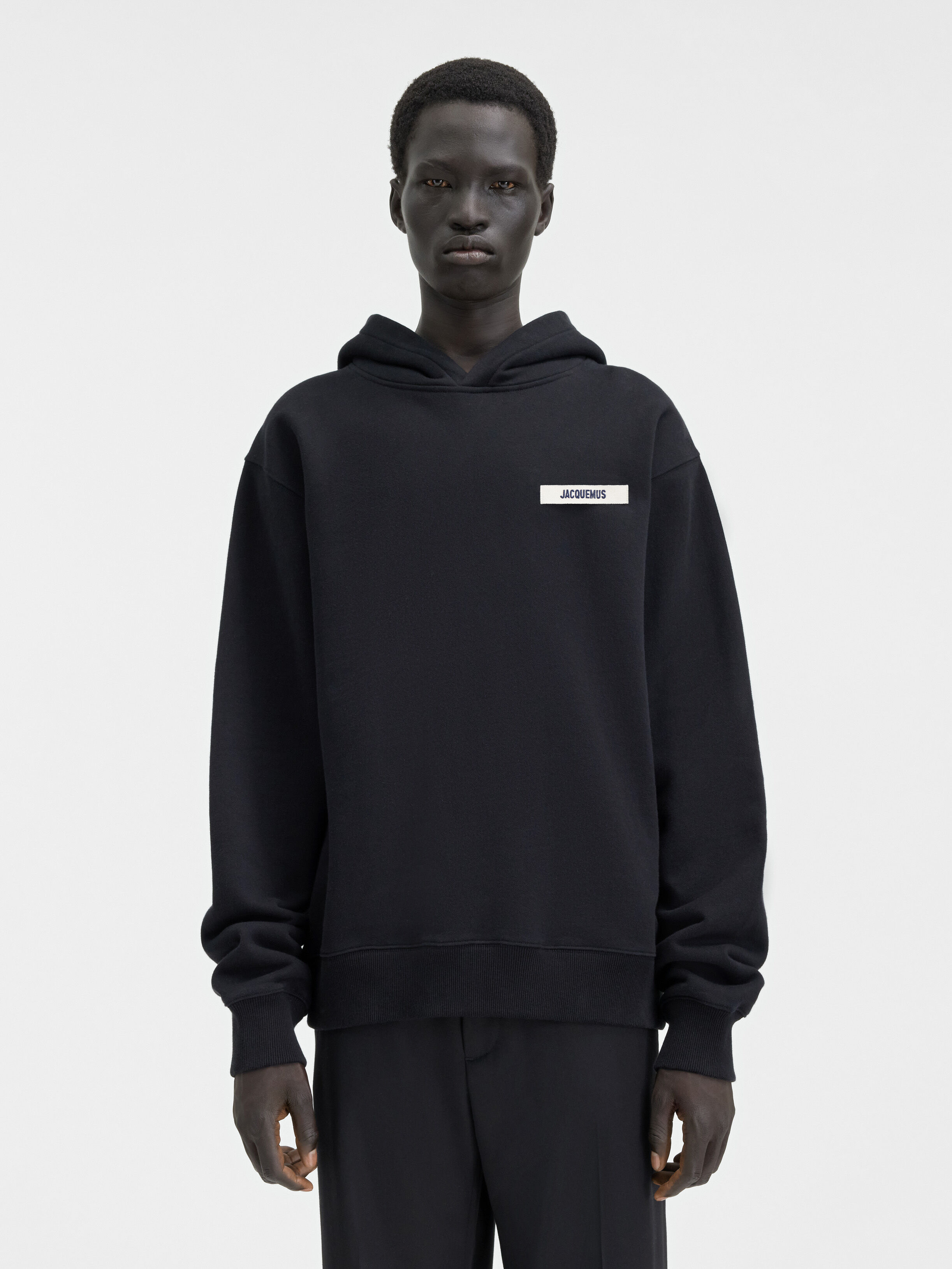 パーカー・フーディ JACQUEMUS Men Sweater 93702 245JS2472036 92573 Black The Jacquemus sweatshirt by JACQUEMUS | Official website