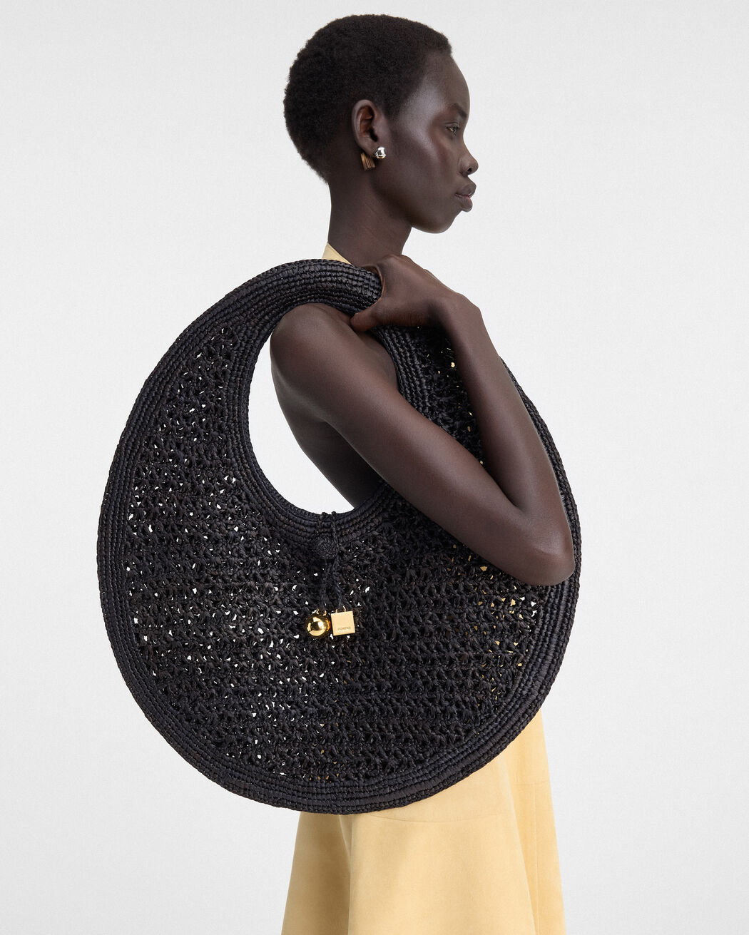 The Spiaggia round حقيبة jacquemus the spiaggia round حقيبة